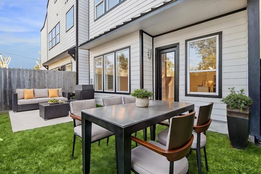 Virtually staged back patio, perfect for indoor/outdoor entertaining