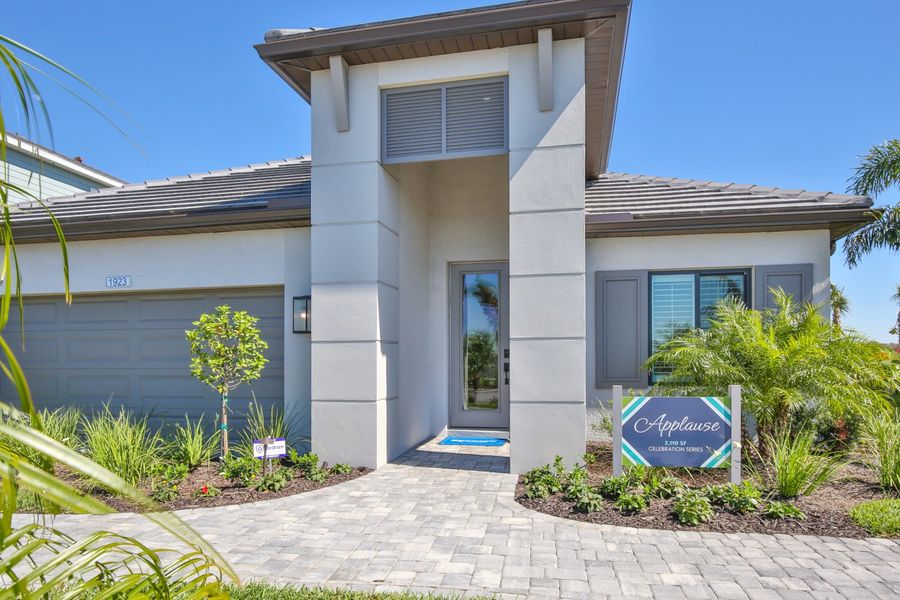Representative exterior photo of a completed home built from the Applause by Neal Communities in Palm Grove, Bradenton, FL (Image 23). Representative exterior photo of a completed home built from the Applause by Neal Communities in Palm Grove, Bradenton, FL (Image 23).