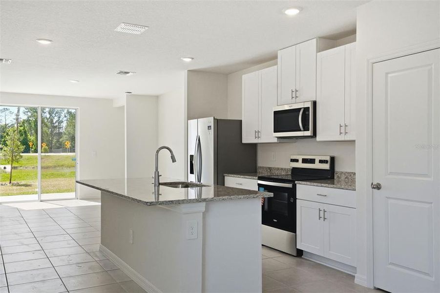 Furnished interior view inside a new home in Leyland Preserve - Premier Series, Brooksville (Image 11).