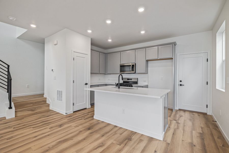 Furnished interior view inside a new home in Painted Prairie, Aurora (Image 6).