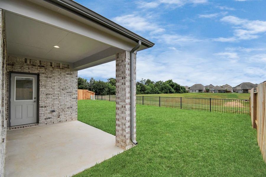 Backyard retreat, offering an abundance of space for kids to play and explore. The possibilities are endless in this outdoor haven, where the joy of open-air activities and family gatherings awaits.