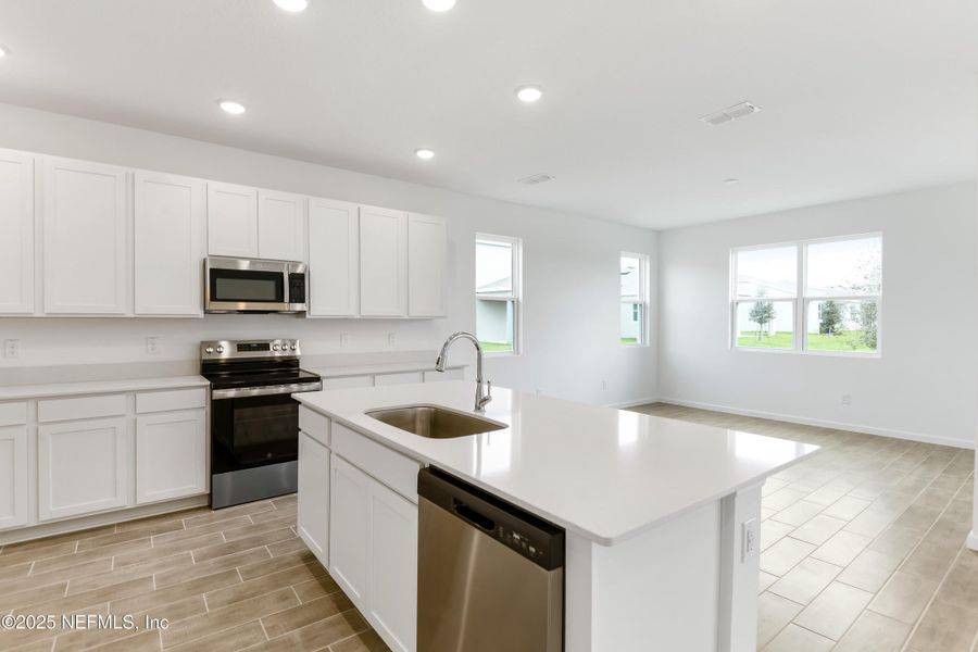 Furnished interior view inside a new home in Seasons at Grandview Gardens, Deland (Image 7).