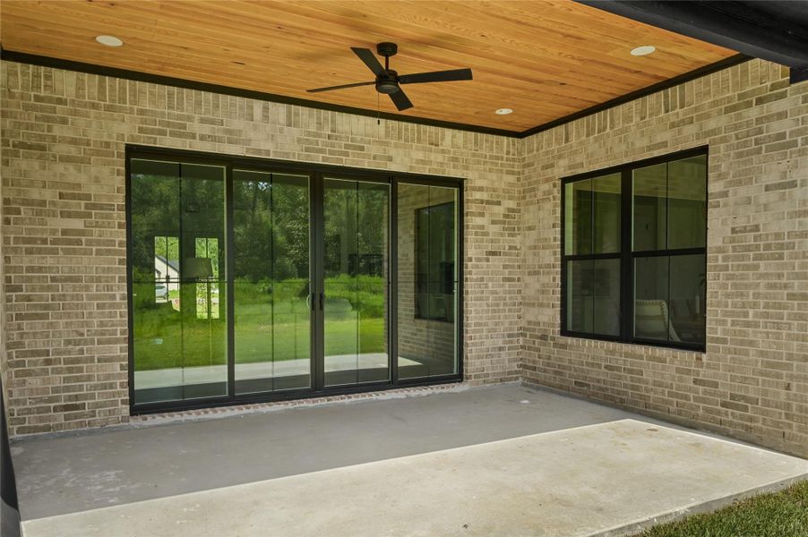 Exterior details and patio area of a home in , Conroe (Image 25). Exterior details and patio area of a home in , Conroe (Image 25).