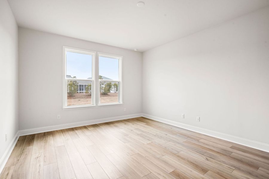 Spacious, unfurnished interior of a new home in Sun City Hilton Head, Bluffton (Image 19).