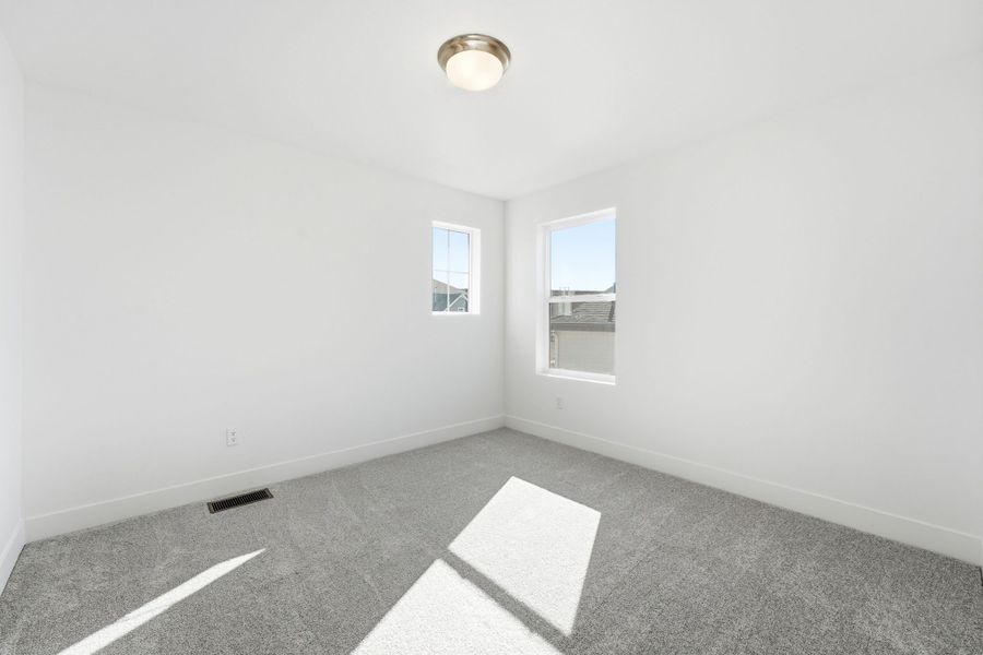 Spacious, unfurnished interior of a new home in Trailstone, Arvada (Image 18).