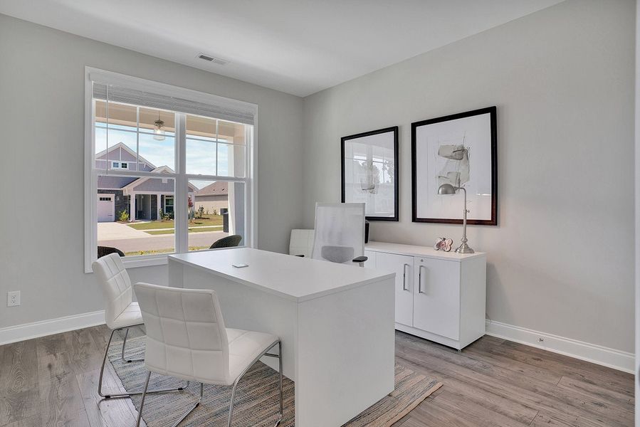 Representative furnished interior of a home built from the Promenade by McKee Homes in The Cottages at 78 North, Sanford (Image 27).