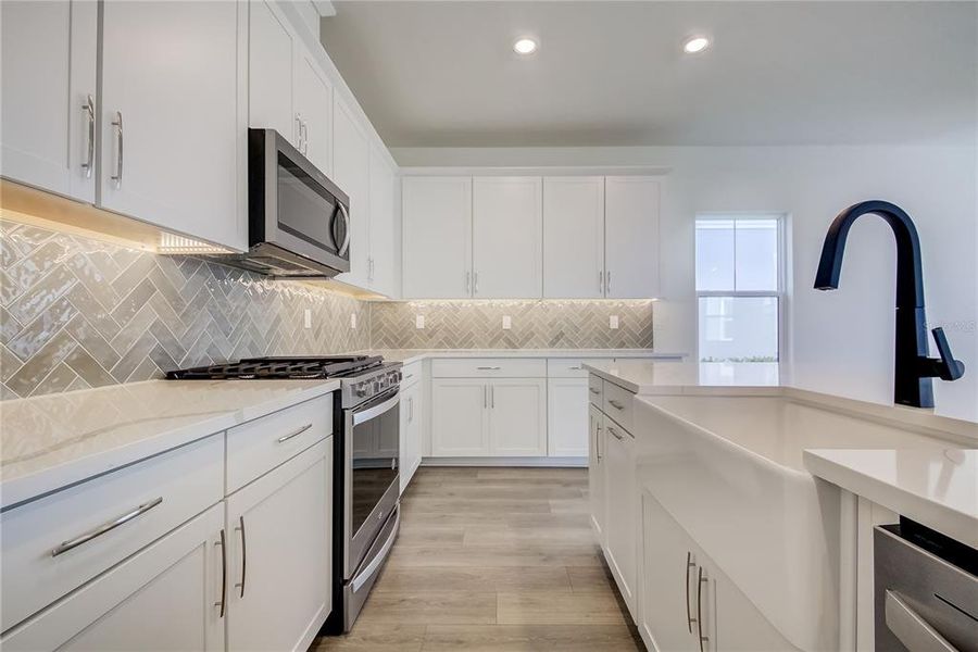 Furnished interior view inside a new home in Bungalow Walk at Lakewood Ranch, Sarasota (Image 7).