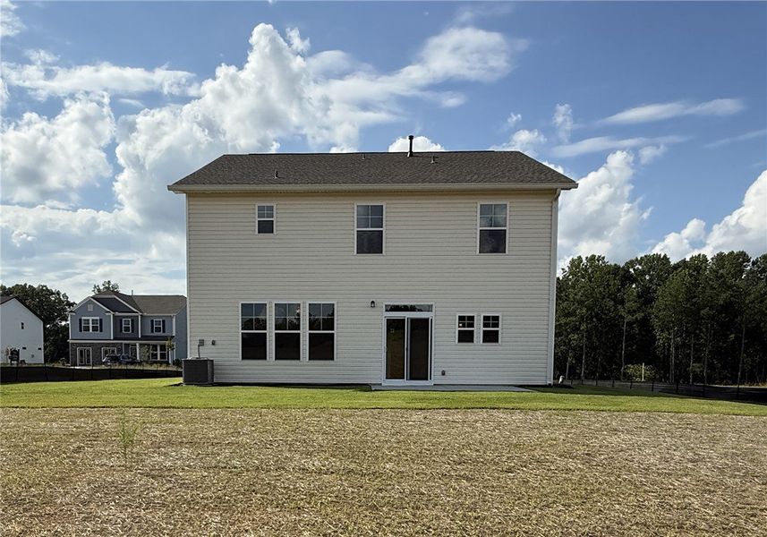 A pristine two-story residence with a spacious bac A pristine two-story residence with a spacious bac