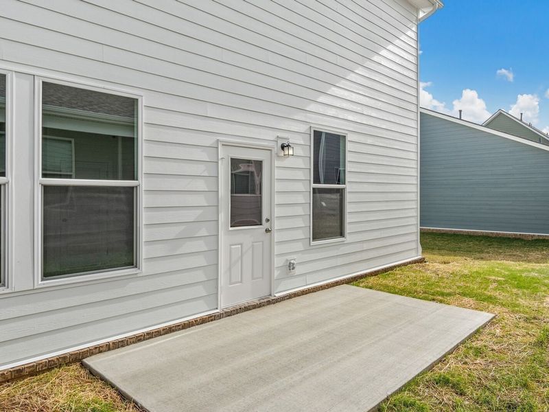 Exterior details and patio area of a home in Sage Farms, White House (Image 3).