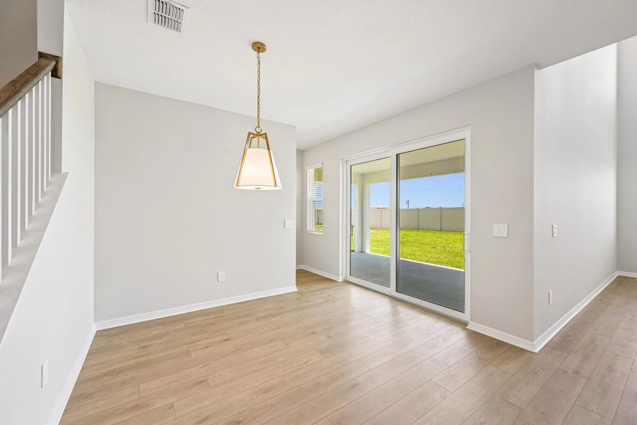 Also off the kitchen you will find the dining nook great for a breakfast spot or homework and it looks out through the large sliding glass door on to the covered lanai
