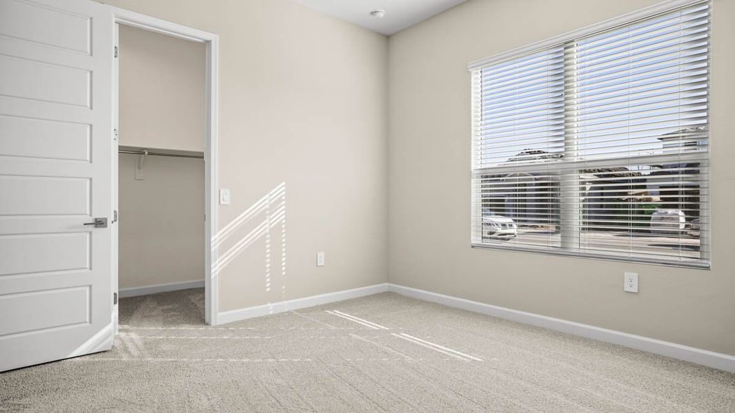 Spacious, unfurnished interior of a new home in Zanjero Pass, Waddell (Image 38).