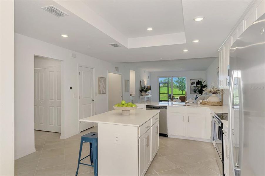 Furnished interior view inside a new home in Wellen Park Golf & Country Club, Venice (Image 46).
