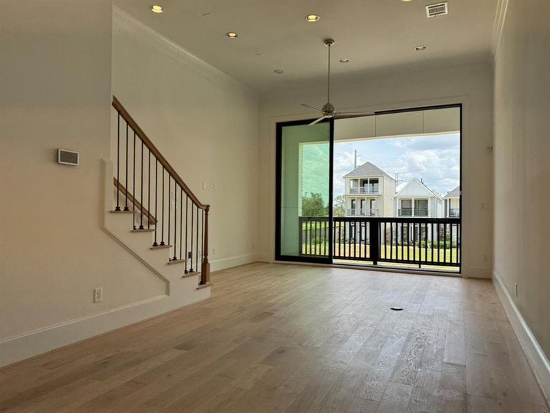 Soaring 12' ceilings and 10' tall sliding glass doors to balcony.