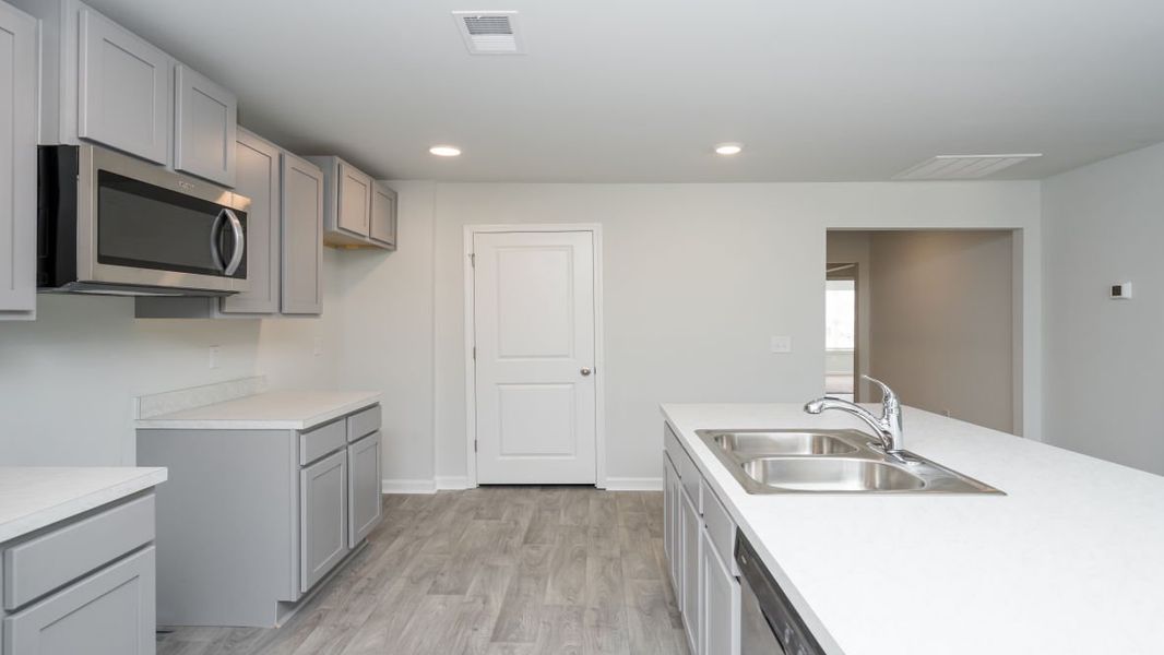 Representative furnished interior of a home built from the ARIA by D.R. Horton in Stanbury Creek, Supply (Image 6).