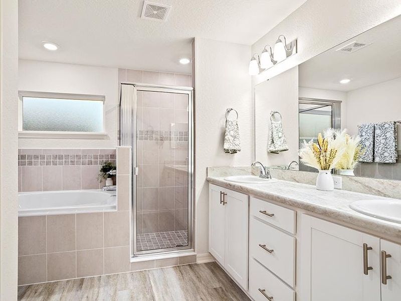 A private en-suite bath provides an at home spa experience - Parker by Highland Homes A private en-suite bath provides an at home spa experience - Parker by Highland Homes