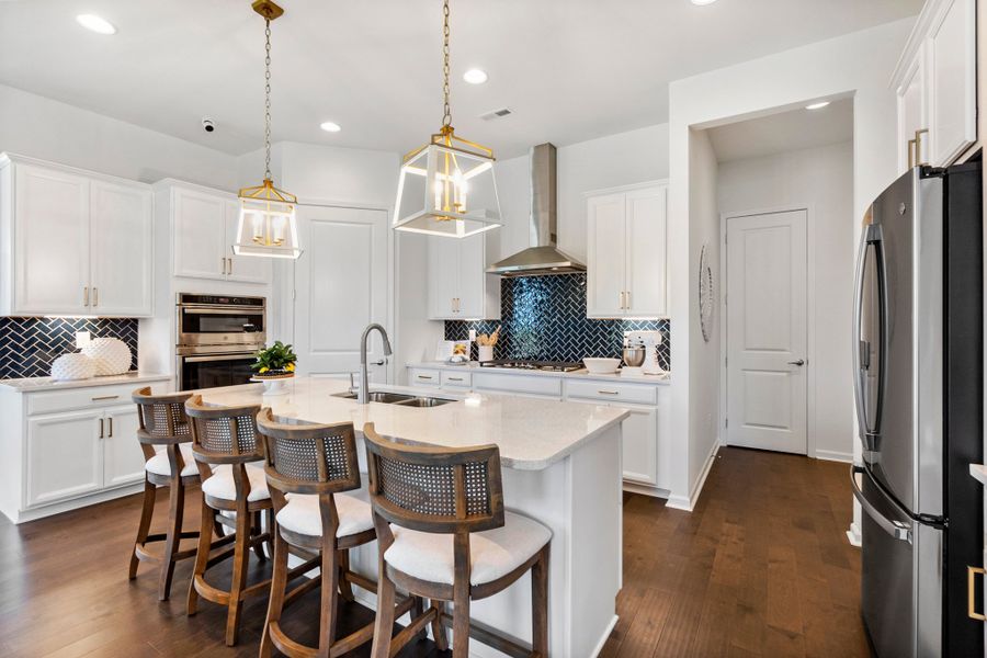 Representative furnished interior of a home built from the Pembrooke by Taylor Morrison in River Falls, Tega Cay (Image 5).