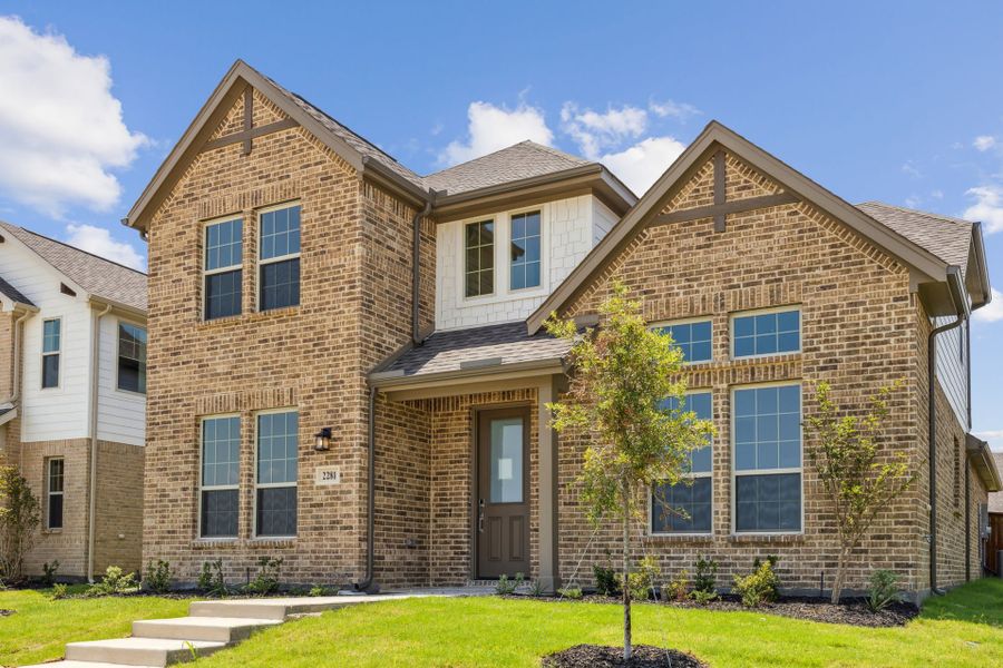 Front exterior of a new home in Dove Hollow, Waxahachie, TX, highlighting curb appeal (Image 18).