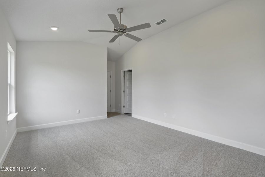 Spacious, unfurnished interior of a new home in Shadow Crest at Rolling Hills, Green Cove Springs (Image 9).