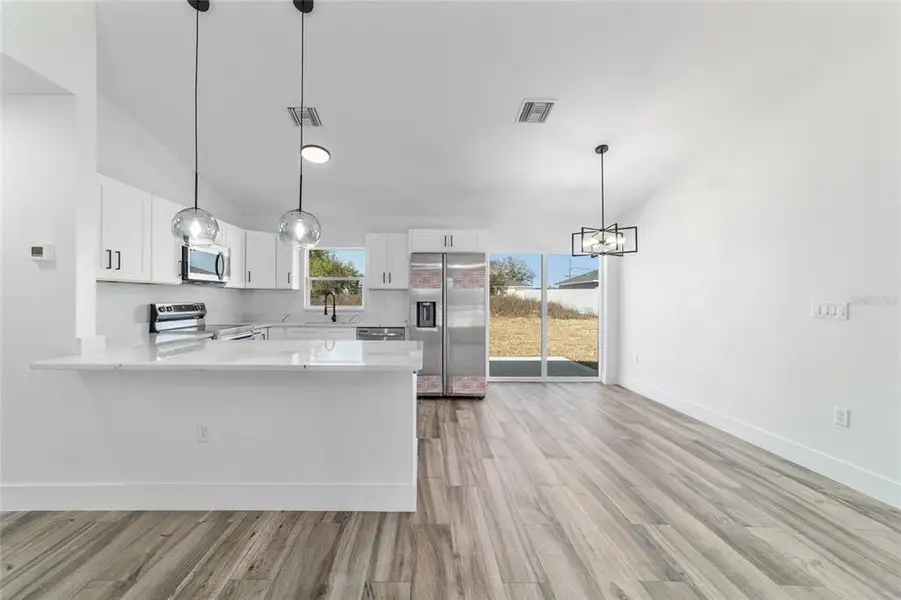 Furnished interior view inside a new home in , Dunnellon (Image 10).