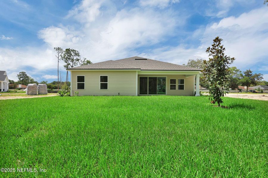 Exterior details and patio area of a home in Creighton Pointe, Fleming Island (Image 28). Exterior details and patio area of a home in Creighton Pointe, Fleming Island (Image 28).