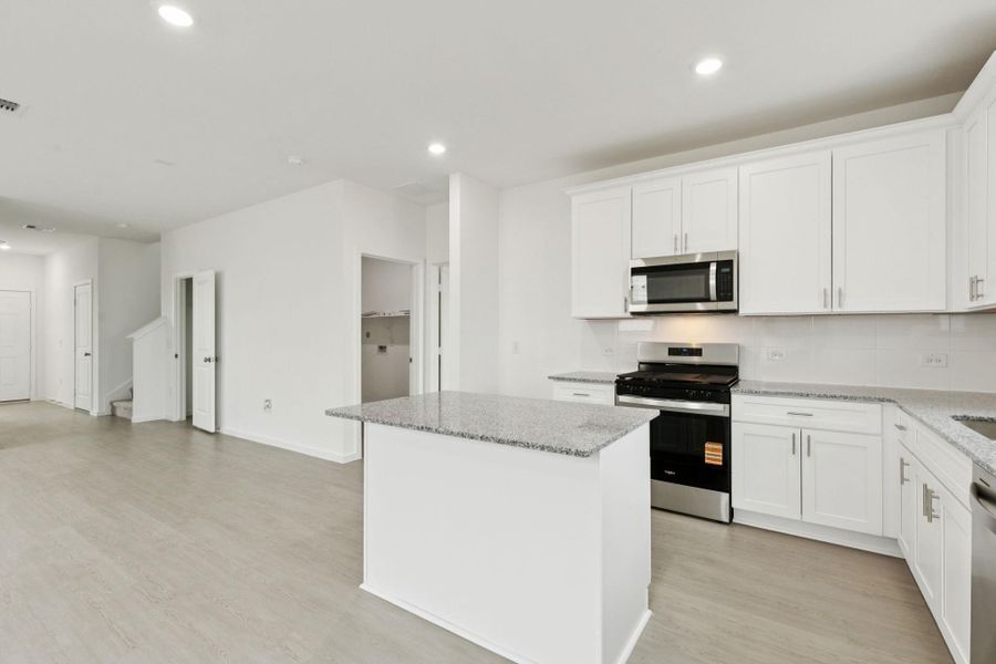 Furnished interior view inside a new home in Windcress, Cove (Image 4).