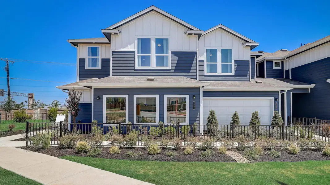 Front exterior of a new home in Center 45, Round Rock, TX, highlighting curb appeal (Image 2).