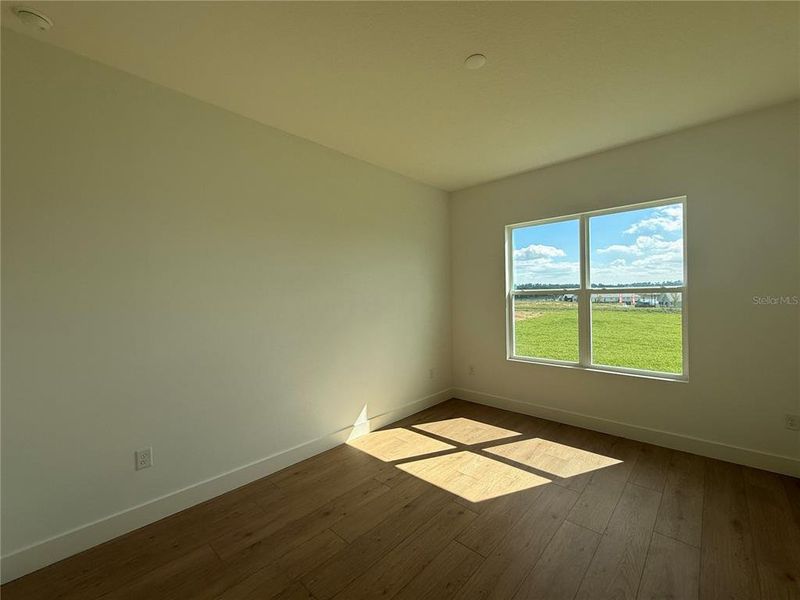 Spacious, unfurnished interior of a new home in West Hill Estates, Dade City (Image 21).