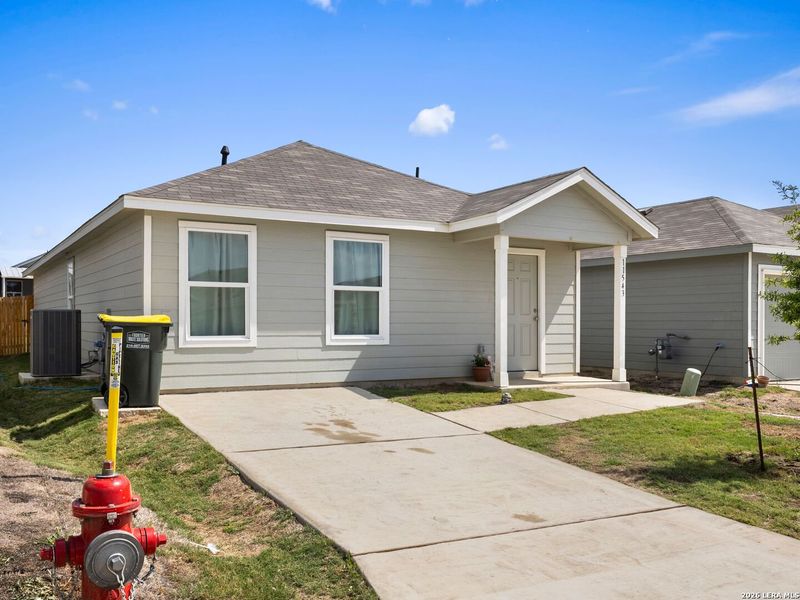 Front exterior of a new home in Rose Valley, Converse, TX, highlighting curb appeal (Image 23).