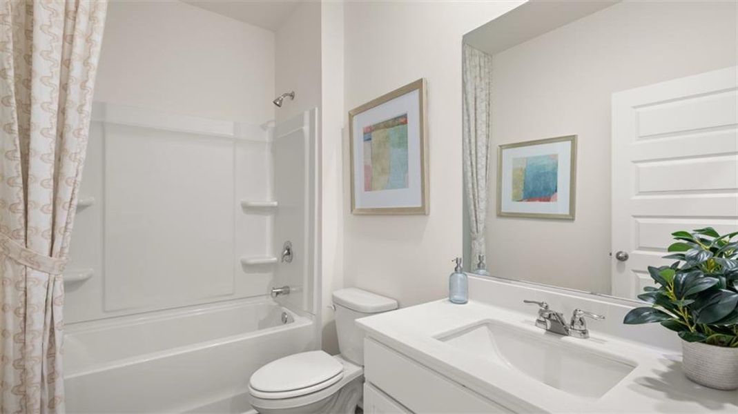 Furnished interior view inside a new home in The Preserve at Agricultural Village, Perry (Image 25).