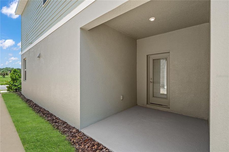 Exterior details and patio area of a home in Spring Walk at the Junction, Debary (Image 27). Exterior details and patio area of a home in Spring Walk at the Junction, Debary (Image 27).