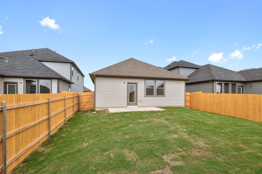 Exterior details and patio area of a home in Trinity Ranch, Elgin (Image 21).