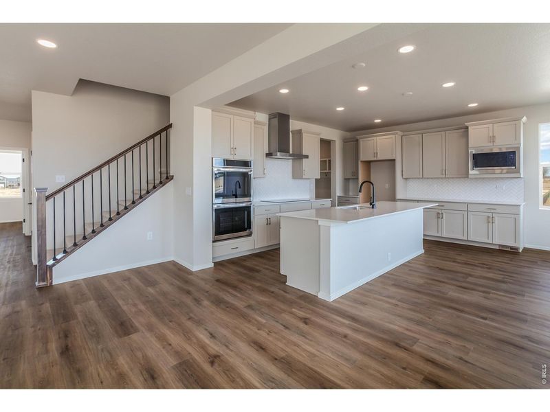 Furnished interior view inside a new home in Prairie Song Story Collection - Single Family Homes, Windsor (Image 6).