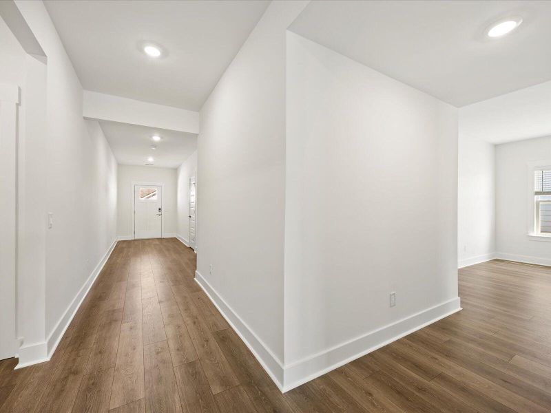 Spacious, unfurnished interior of a new home in The Coves at Lakes of Cane Bay II, Summerville (Image 20). Spacious, unfurnished interior of a new home in The Coves at Lakes of Cane Bay II, Summerville (Image 20).