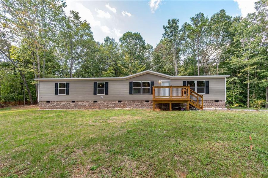 Exterior details and patio area of a home in , Dahlonega (Image 1).