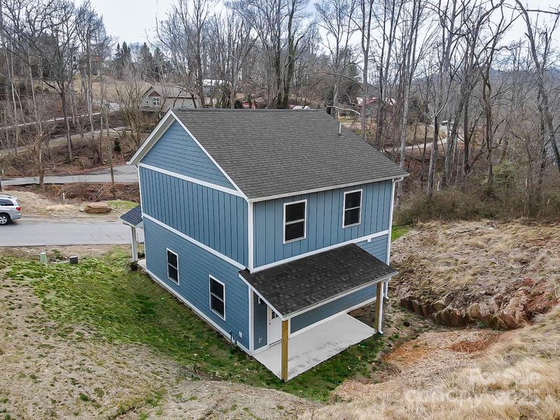 Front exterior of a new home in , Asheville, NC, highlighting curb appeal (Image 11).