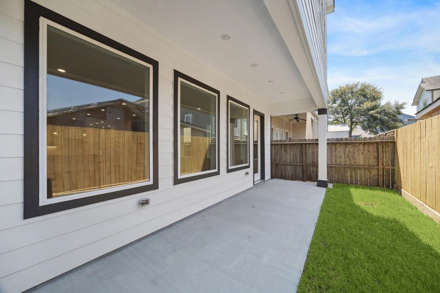 Exterior details and patio area of a home in , Houston (Image 3).