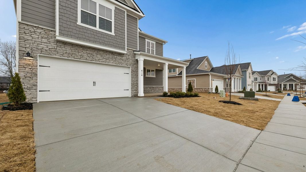 Exterior details and patio area of a home in Harvest Point, Spring Hill (Image 3).