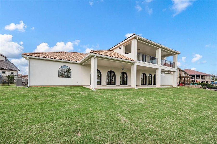 Exterior details and patio area of a home in The Resort on Eagle Mt. Lake, Fort Worth (Image 28).