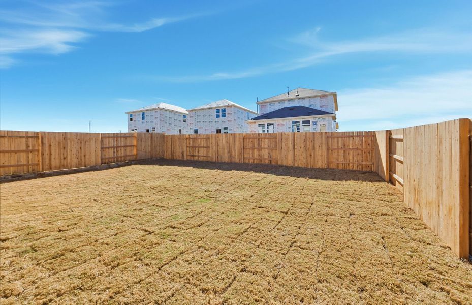 Exterior details and patio area of a home in Sunfield, Buda (Image 26).