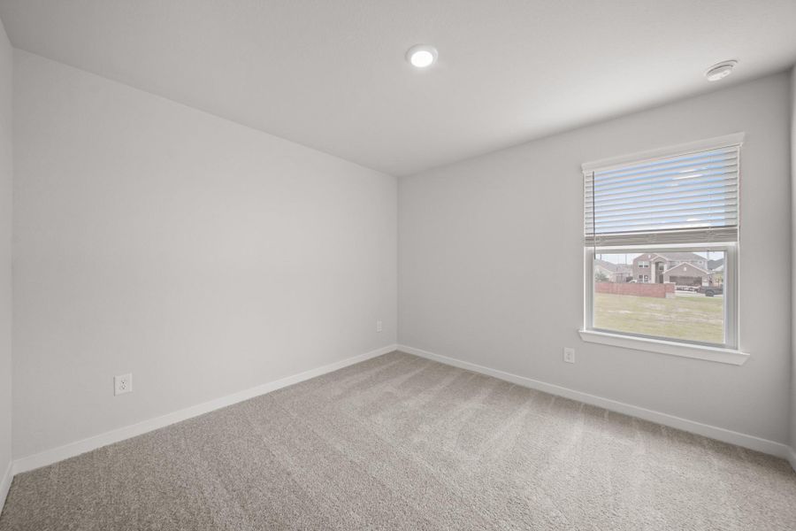 Spacious, unfurnished interior of a new home in Sunterra, Katy (Image 27).