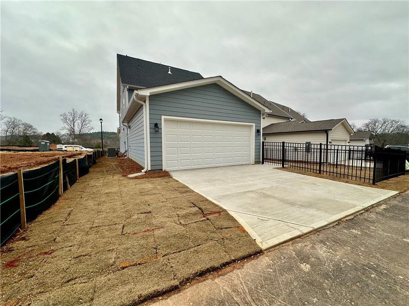 Exterior details and patio area of a home in Marble Tree, Ball Ground (Image 21).