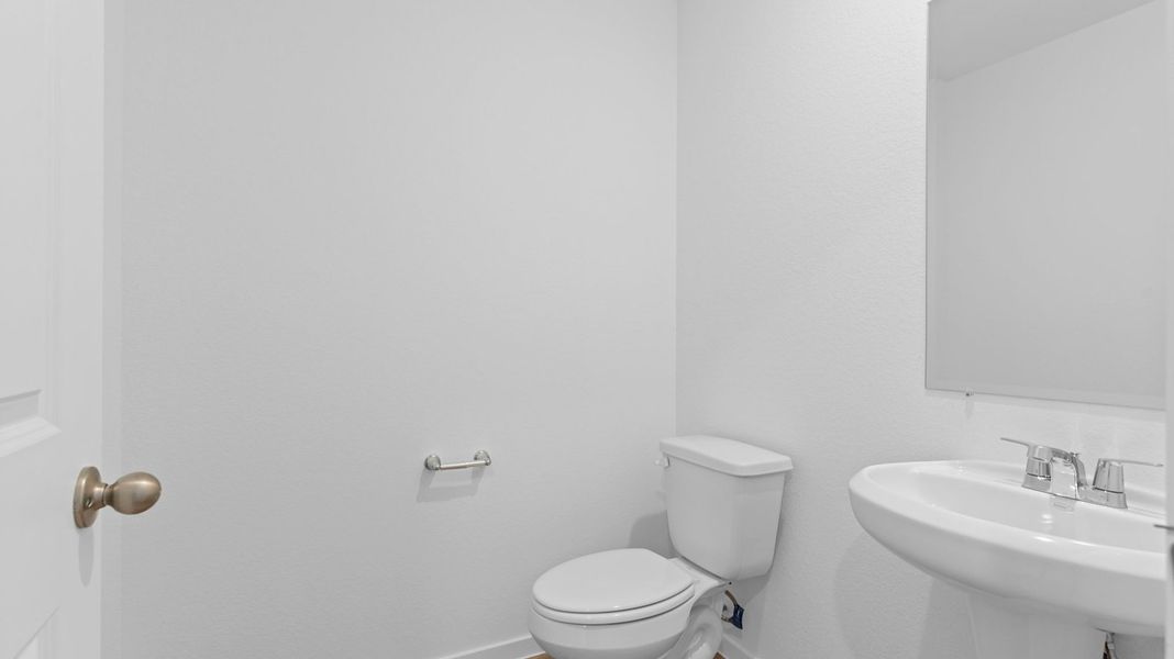 Furnished interior view inside a new home in Caldwell Crossing, Iowa Colony (Image 6).