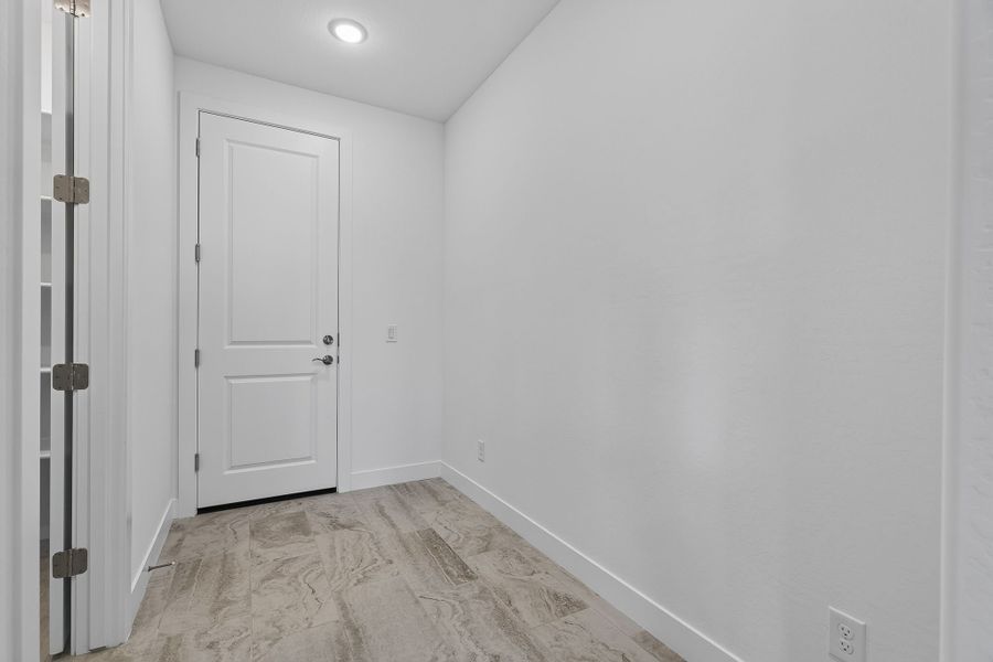 Spacious, unfurnished interior of a new home in The Grove at El Cidro, Goodyear (Image 26).