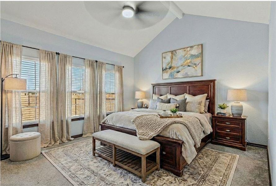 STAGED PHOTO of primary bedroom