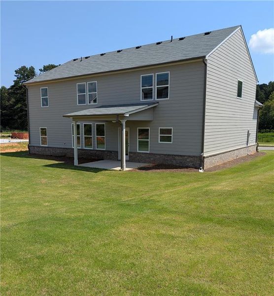 Front exterior of a new home in , Auburn, GA, highlighting curb appeal (Image 2).
