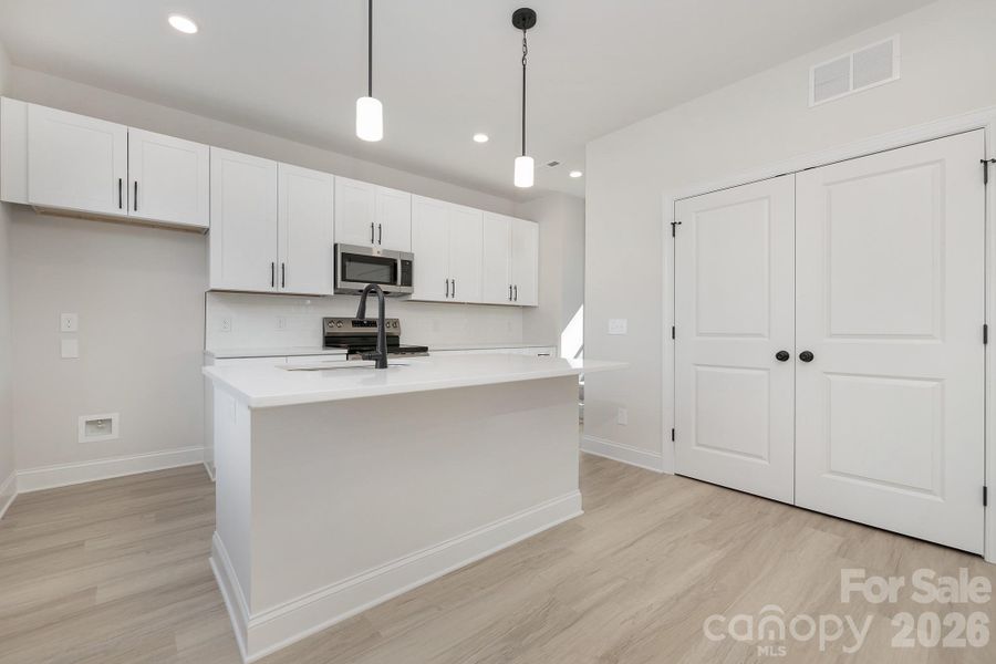 Furnished interior view inside a new home in , Statesville (Image 7).