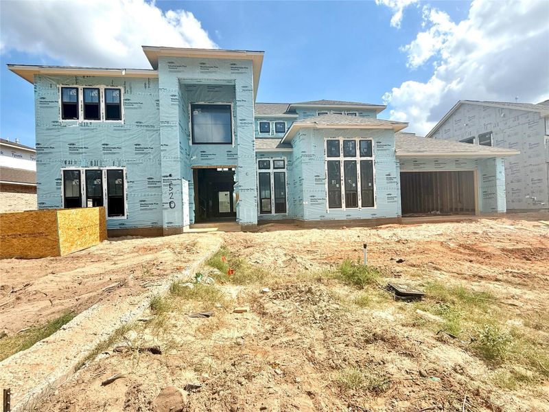 Exterior details and patio area of a home in Grand Central Park Deer Lake Estates, Conroe (Image 3). Exterior details and patio area of a home in Grand Central Park Deer Lake Estates, Conroe (Image 3).