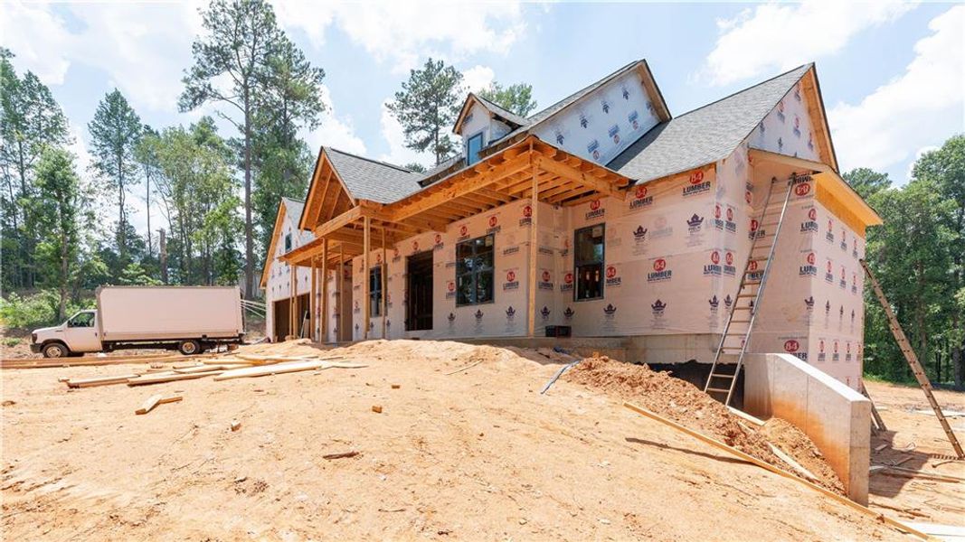 Front exterior of a new home in , Carrollton, GA, highlighting curb appeal (Image 22).
