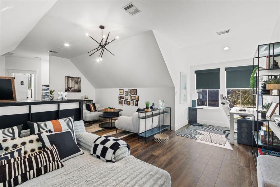 This upstairs space has a full sized bedroom and bathroom. The opportunity to make a separated apartment area with access at the bottom of stairs is here.