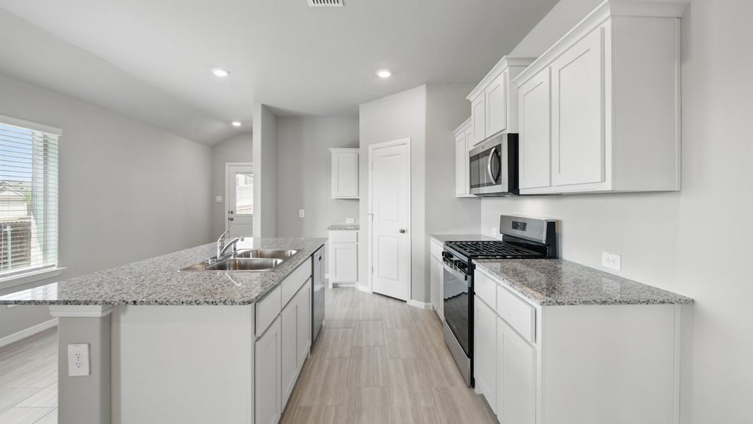 Furnished interior view inside a new home in Springhill South, Boyd (Image 6).